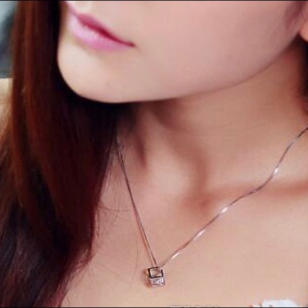 Crystal zircon within cube pendant & necklace
